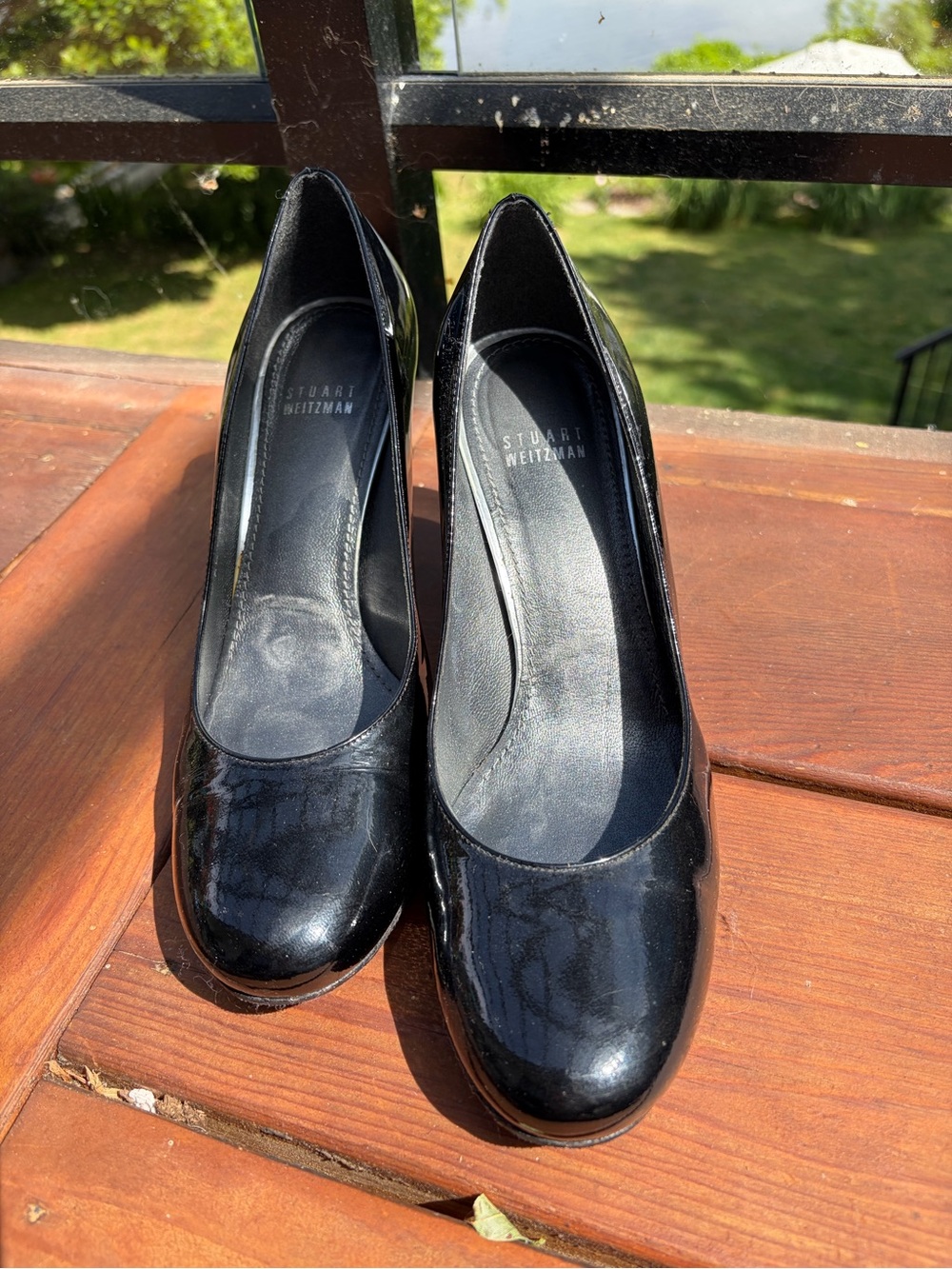 Stuart Weitzman Glossy Black Patent Leather Round-Toe Pumps